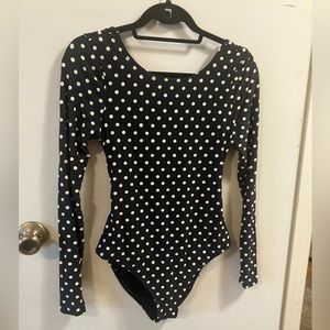 Billabong size large women’s long sleeve polka dot swimsuit. NWOT.